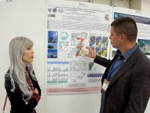  к.г.н П.Ю. Семкин на сессии стендовых докладов